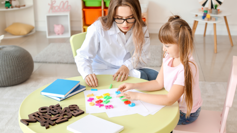 Therapist with a child doing puzzles. I think my child may be Autistic – What do I do now? How do I pursue an autism diagnosis 